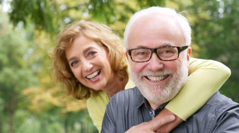 elderly preventative dentistry couple hugging